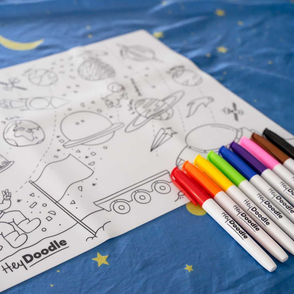 Hey Doodel Outer Space Reusable silicone mat displayed with markers