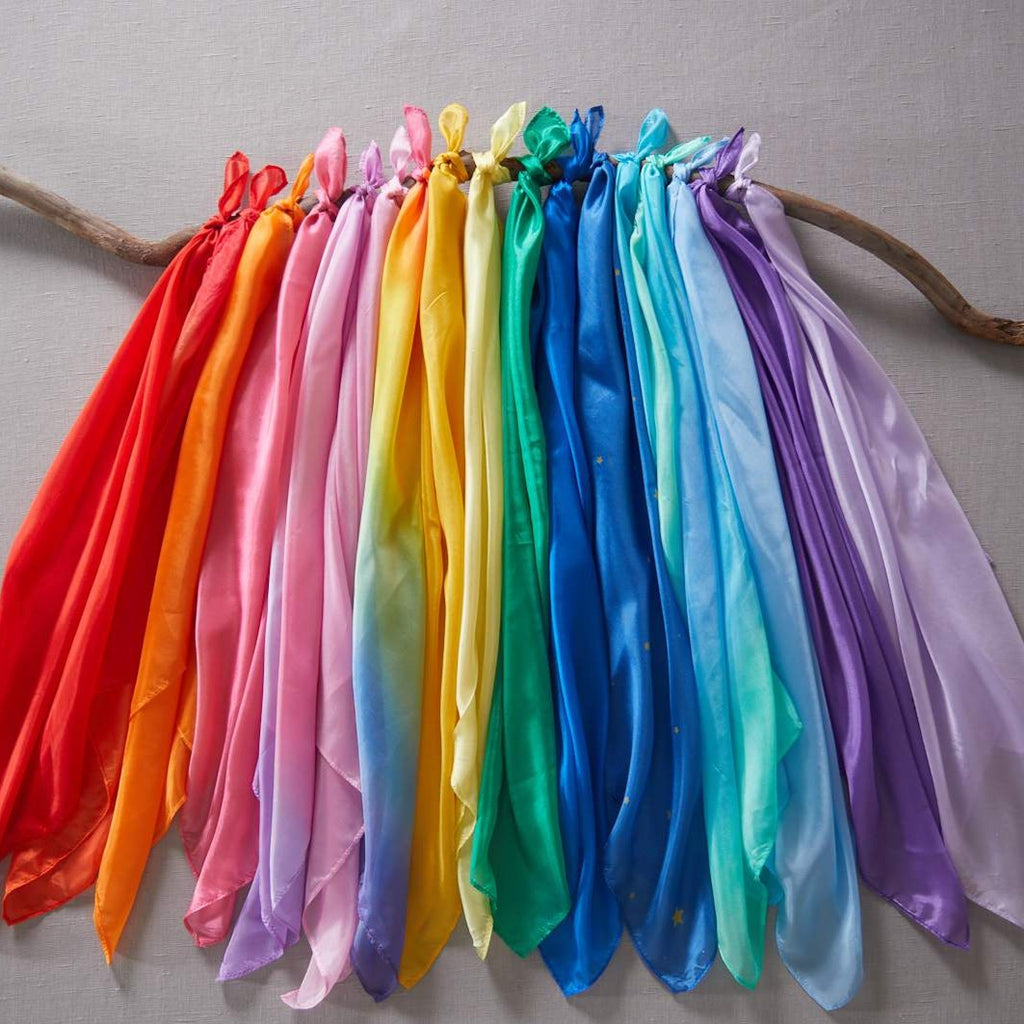 Sarah's Silks - mini silks all displayed in rainbow colours om wooden branch