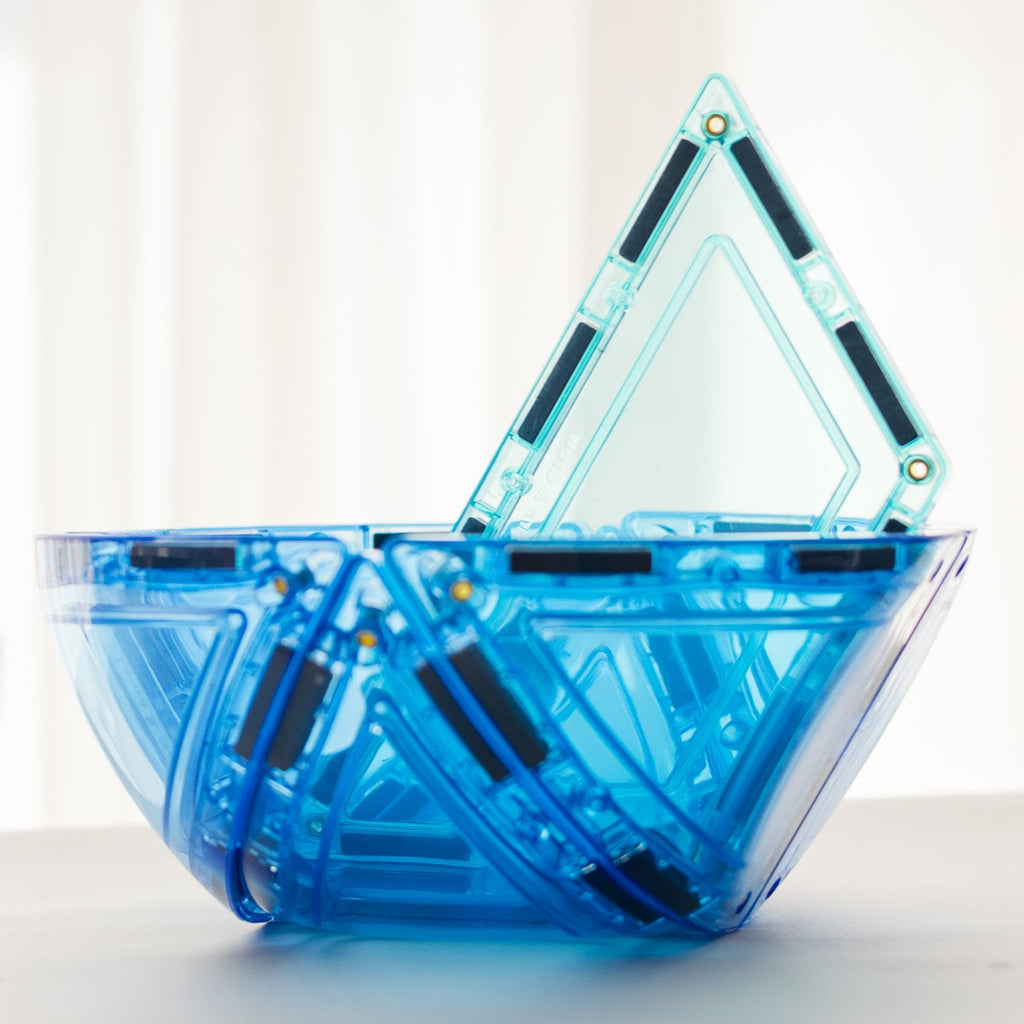 Blue and purple geometric transparent containers on a white background