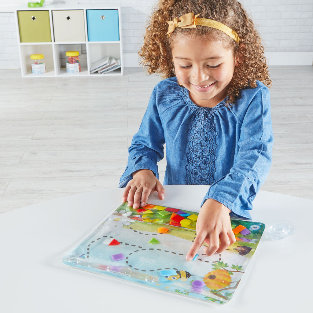 Child using Colours & Shapes Sensory Pad