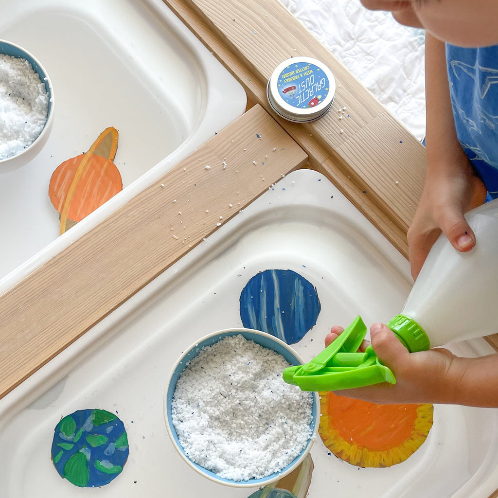 Space themed sensory play activity with galactic dust 