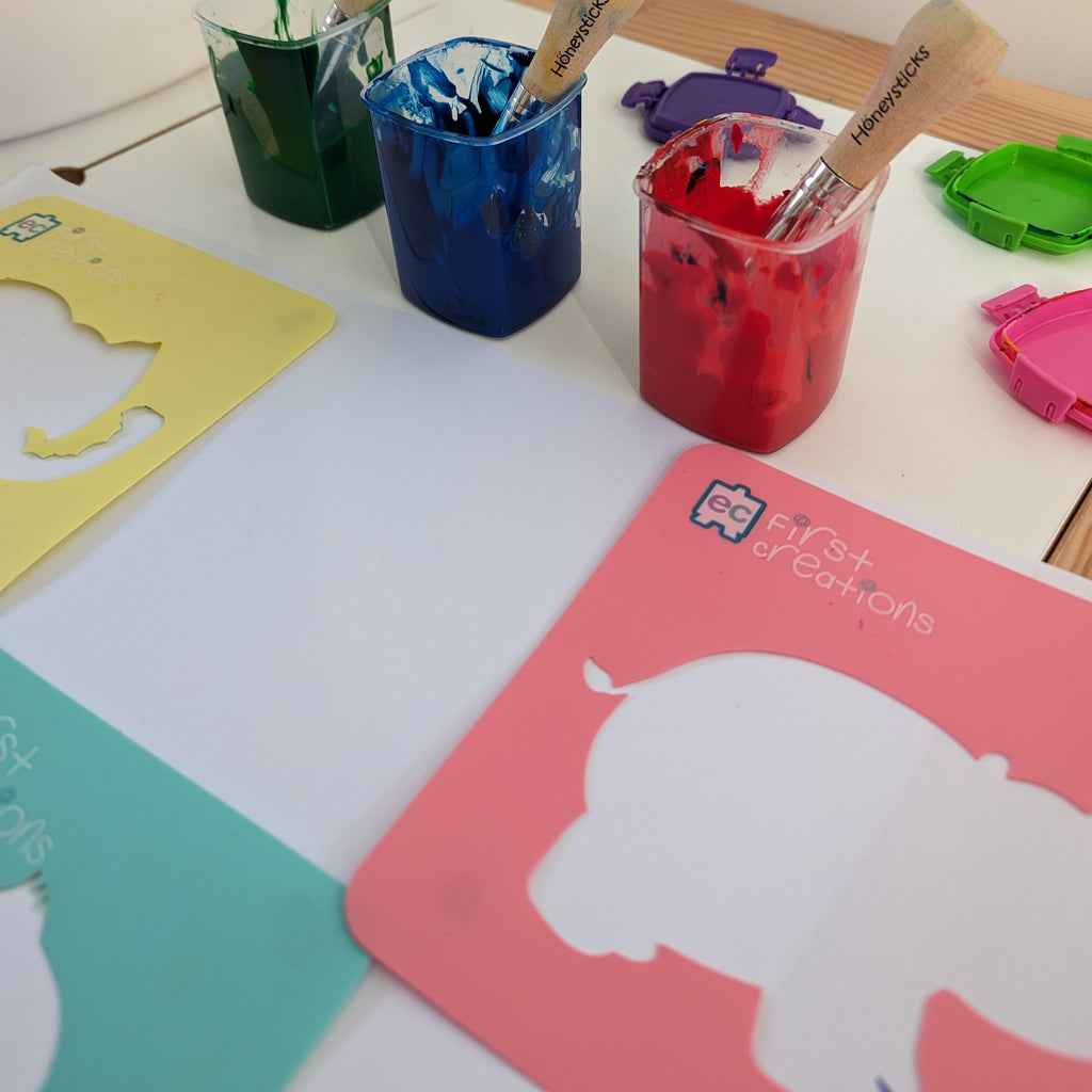 Animal stencils being used with paint