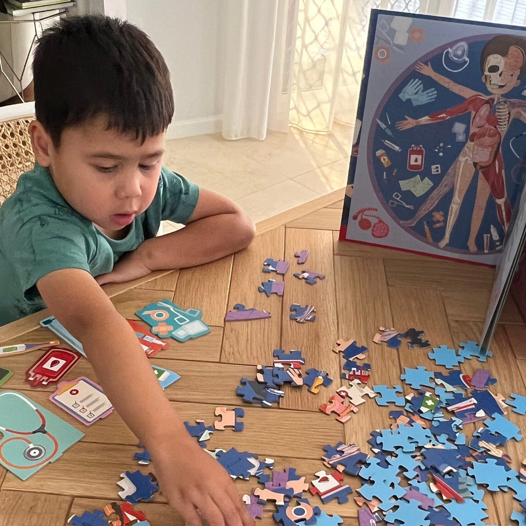 Child playing with All About the Body Puzzle