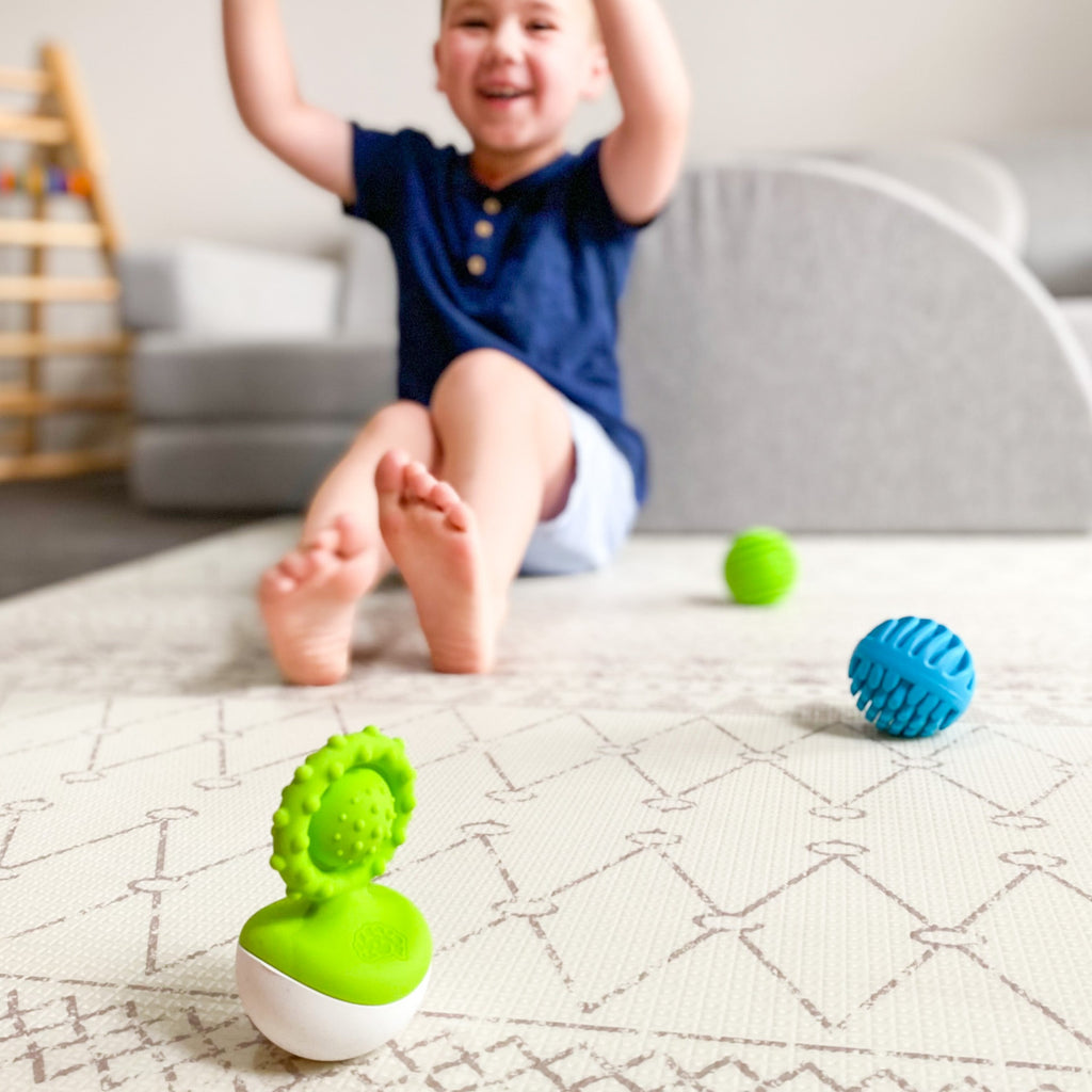 Fat Brain Dimpl Wobl set up game with sensory balls