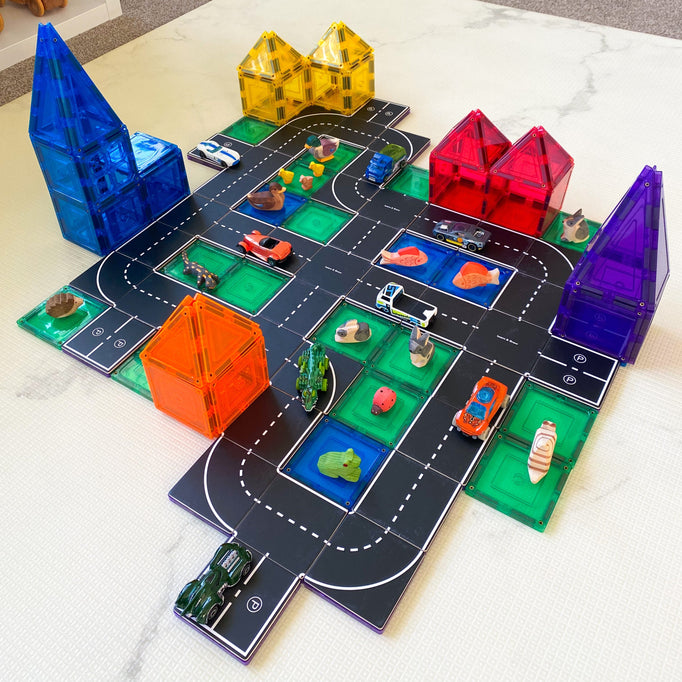 Magnetic tile and road topper set up 