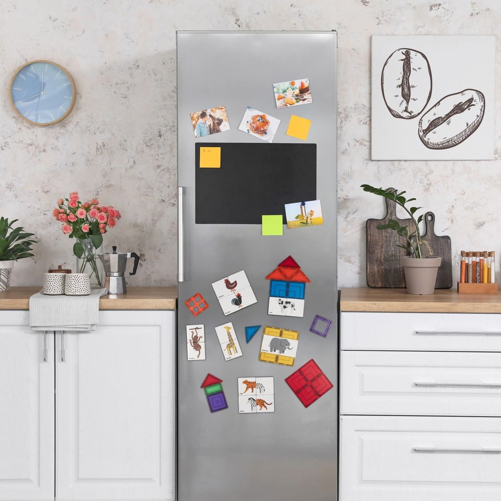 Duo Animal puzzle pack tile toppers displayed on a fridge in a kitchen