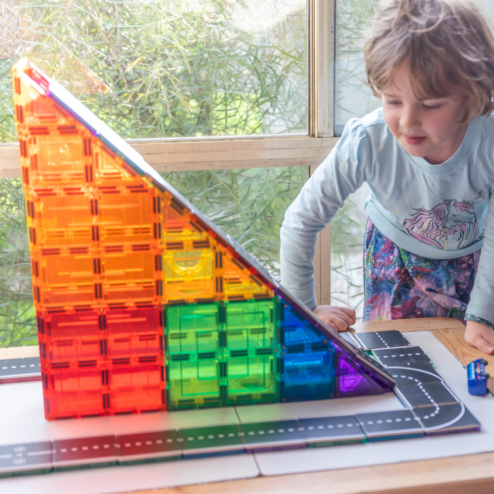 Rainbow tiles using road toppers to create large hill with trackin