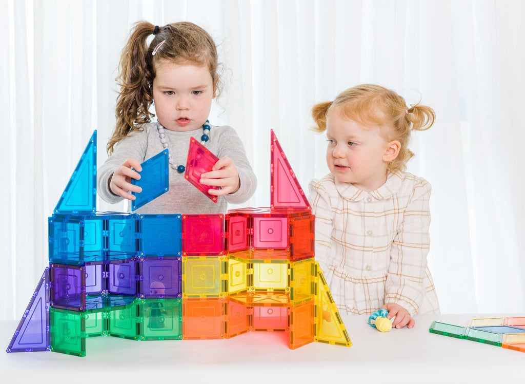 36 pc geometry magnetic tile pack being played with by 2 young child