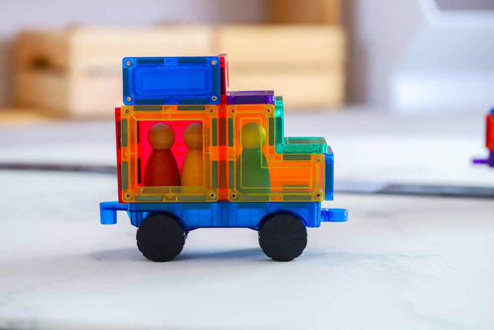 Brightly coloured magnetic car from Learn and Grow car pack with wooden peg people inside 