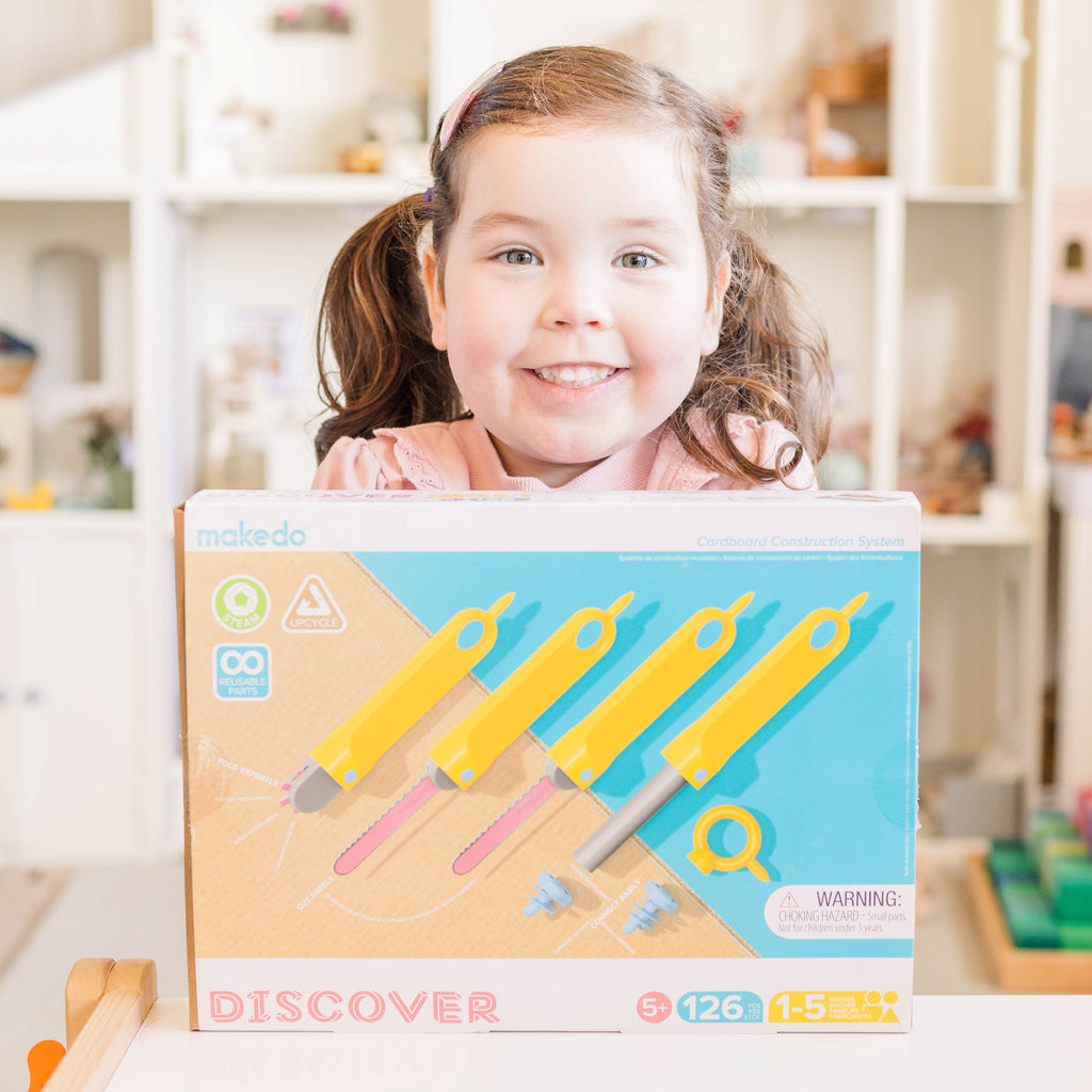 Makedo discover kit on display with child