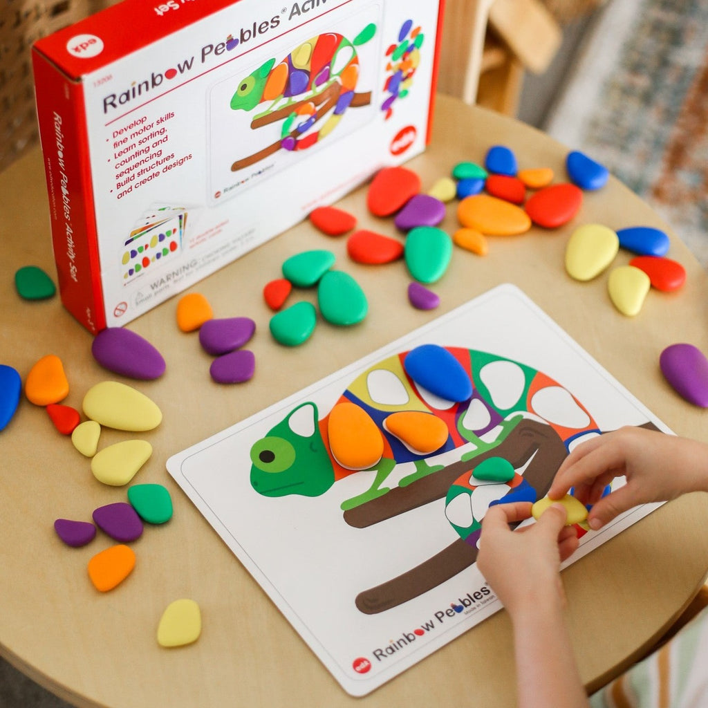 Edx Rainbow pebble activity set played with on table