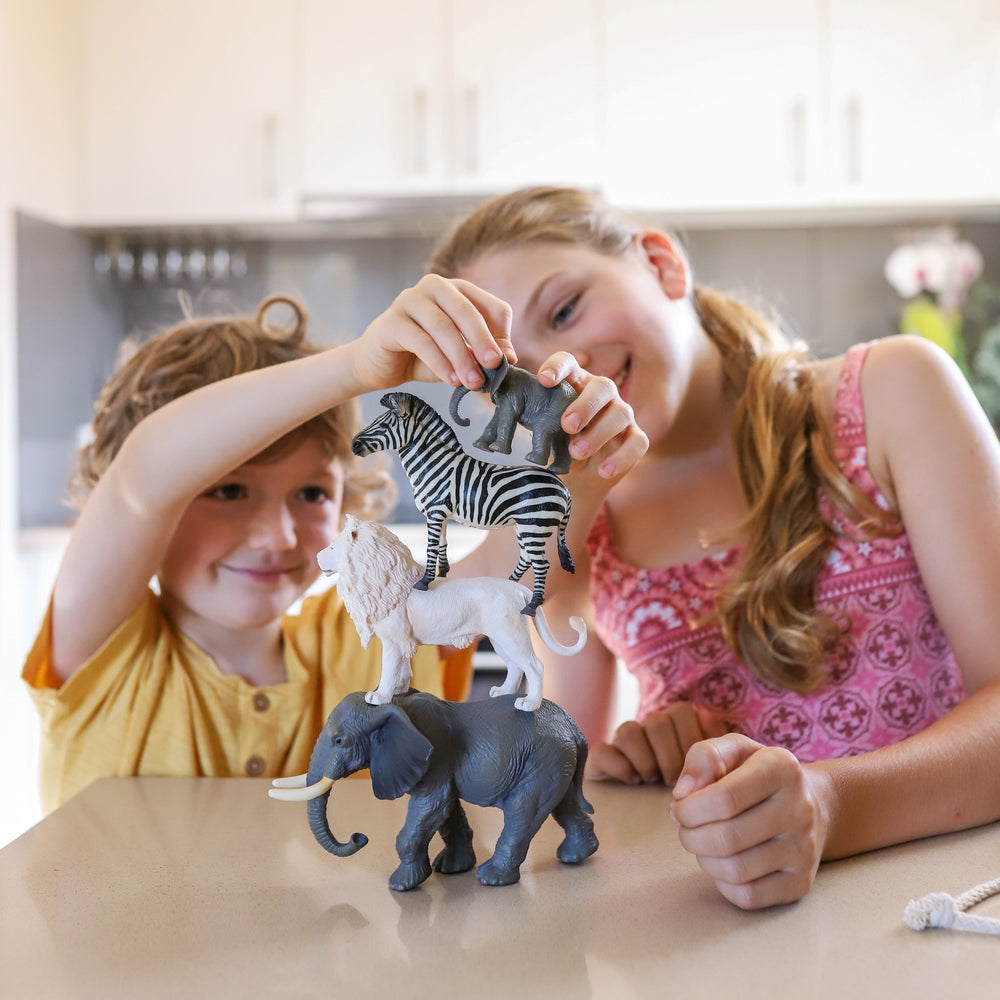 kids playing with collecta safari themed animals